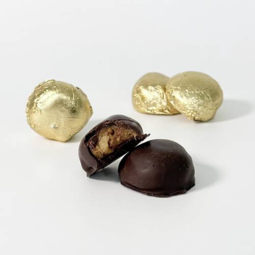Tortugas de caramelo con nuez del nogal, cubiertas con chocolate